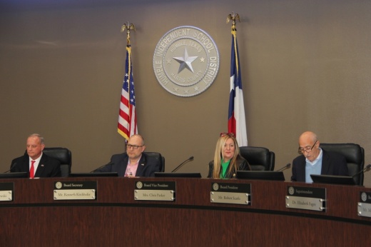 A shot of Humble ISD trustees sitting in the district's administrative building during a board meeting