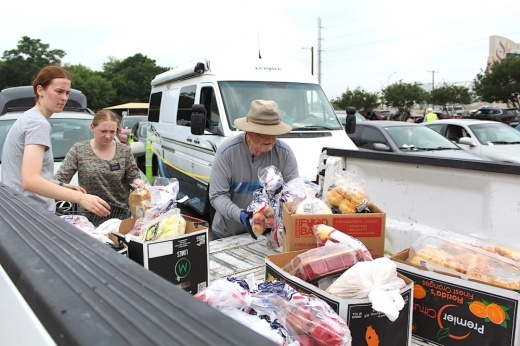 people picking up food