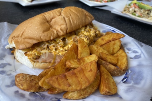 The Pflugerville Taco House sells breakfast tortas, which can come with bacon, ham, sausage, chorizo and more. (Grant Crawford/Community Impact)