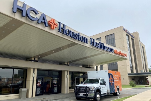 An exterior photo of the HCA Houston Healthcare Northwest entrance with an ambulance (Courtesy HCA Houston Healthcare Northwest)