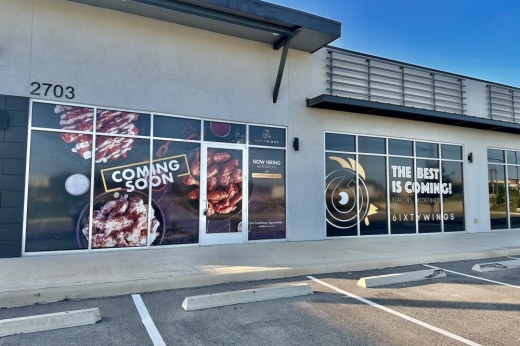 Image shows exterior of 6ixty Wings.