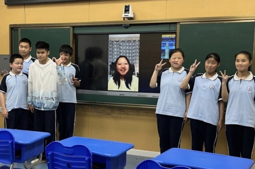 Crystal Yang, Katy ISD student and Audemy founder, meets with student game testers in China. (Courtesy Audemy)