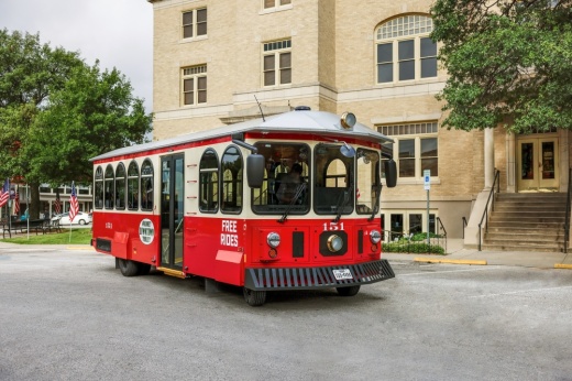 Exterior of the trolley parked in front of the McKinney Performing Arts Center
