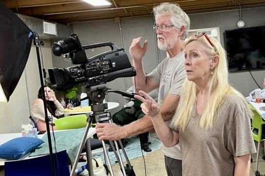 camera with people filming