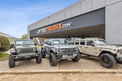 Jeeps in front of the Lifted Trucks dealership