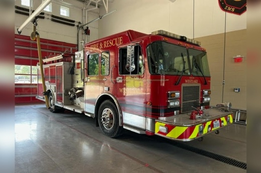A town of Westlake firetruck vehicle parked in a garage.