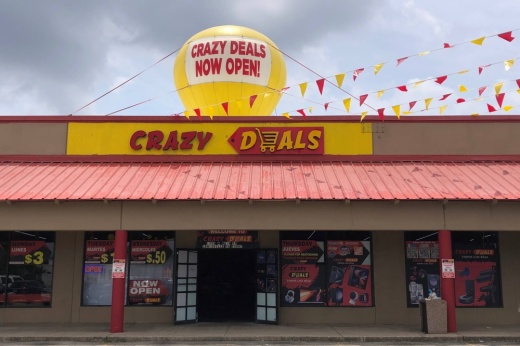 Building with Crazy Deals signage.