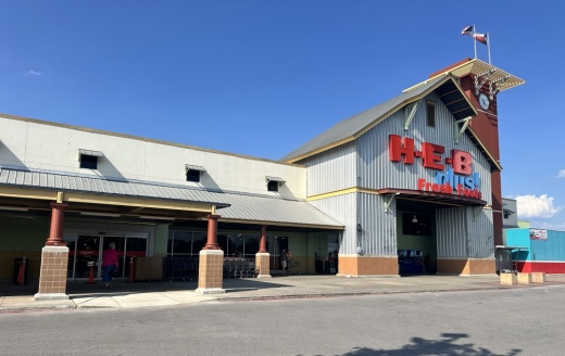 An exterior shot shows the front of the store and the old curbside area.