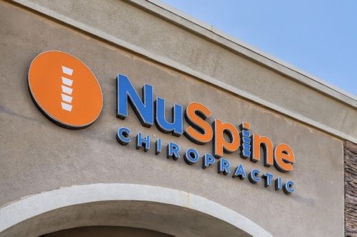Image shows NuSpine building signage.