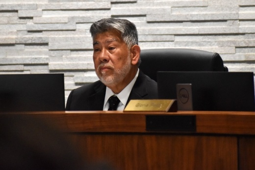 Vince Puente sitting on council