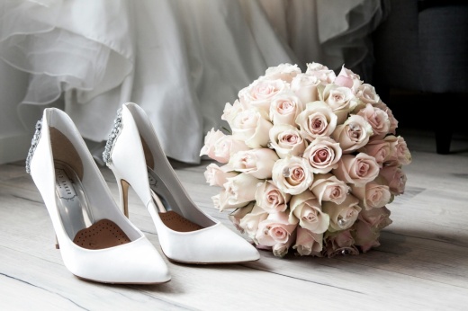 Photo shows wedding shoes.