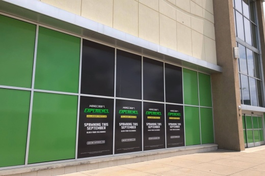 Exterior of building with Minecraft Experience signage.
