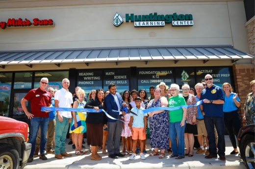An image of the ribbon cutting ceremony of the center.