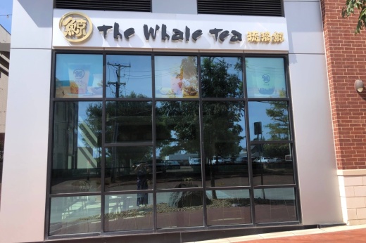 Exterior of a building with The Whale Tea signage.