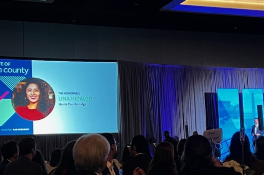 A photo of the stage where speakers are talking.