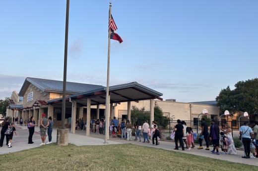 Parents walk students into Berkman Elementary School, which could receive additional classrooms if the November bond proposal passes. (Brooke Sjoberg/Community Impact)