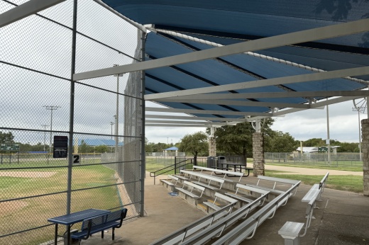 Shade structures and benches at Wagon Wheel Park in Coppell