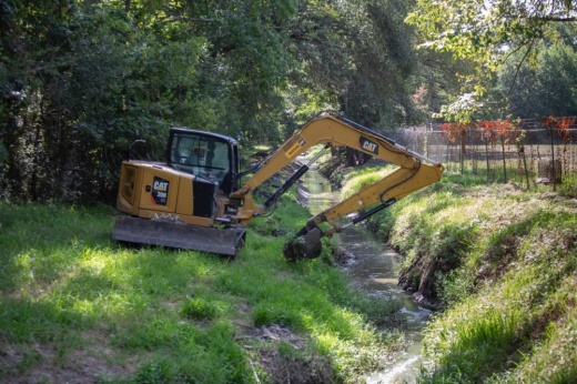 A photo of a construction on a channel.
