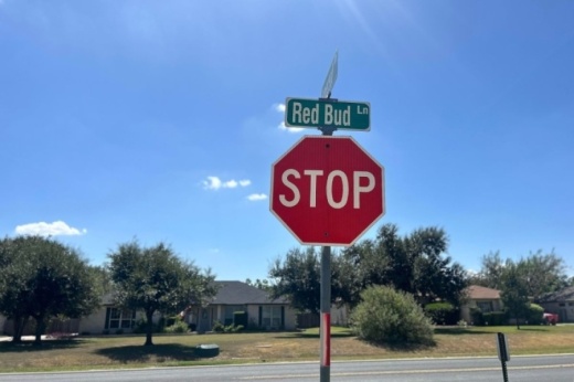 Red Bud Lane North improvements will upgrade the two-lane roadway to a four-lane roadway from US 79 to CR 117. (Gracie Warhurst/Community Impact)