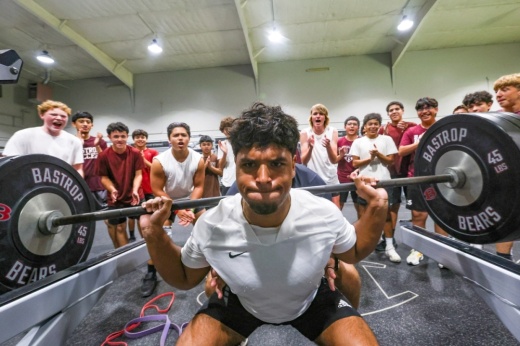 Damian Acosta, senior at Bastrop High School working out in weight room