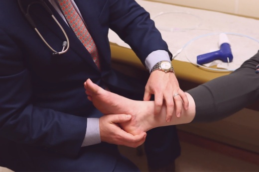 Dr. Michael Hust demonstrates a Medtronic VenaSeal system, which treats varicose veins. (Courtesy Cypress Cardiovascular Institute)