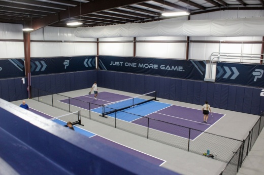 An image of one of the pickleball courts from the mezzanine upstairs.
