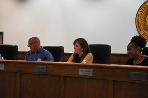 Leander Mayor smiling while speaking from the dais.