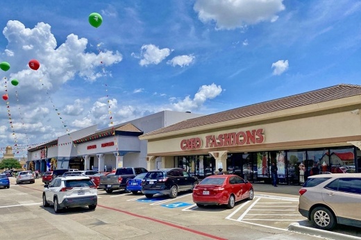 The more than 58,000-square-foot center is anchored by a newly opened Fiesta Mart along with over 20 other shops. (Courtesy Disney Investment Group)