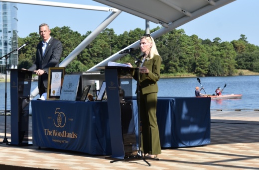 Two speakers at a pavilion