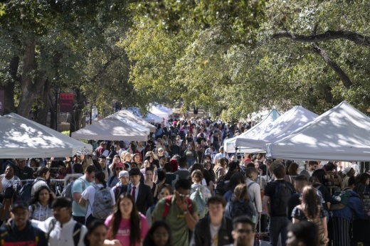 Students walk on Texas State University's campus