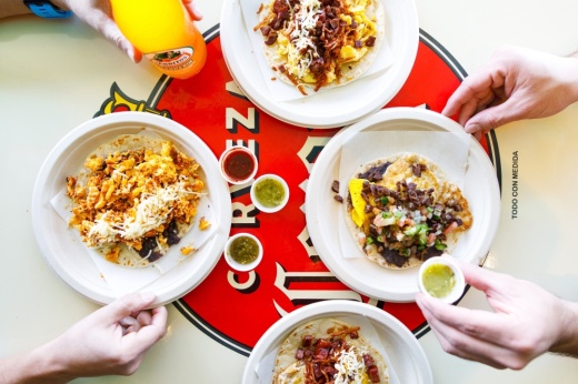 OneTaco menu items include traditional Mexican street tacos, chips and salsa, and margaritas. (Courtesy OneTaco)