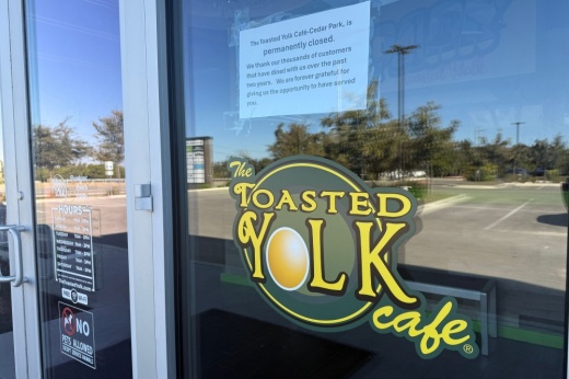 An image of the signs posted on the front door.