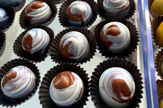 Truffles in a display case.