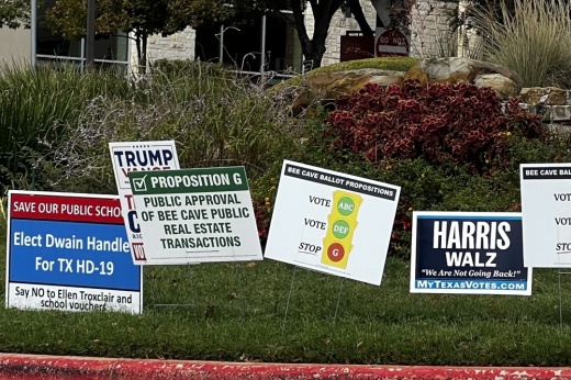 Political posters in Bee Cave. (Grace Dickens/Community Impact)