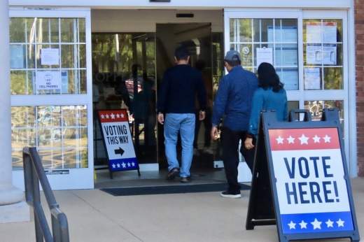 Residents file into Coppell Town Hall Nov. 5 to cast their votes. Coppell ISD residents will consider a tax rate election on the ballot. (Jonathan Perriello/ Community Impact)
