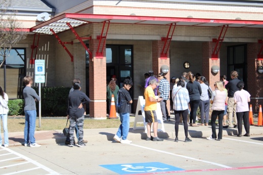 voters line up at a polling station