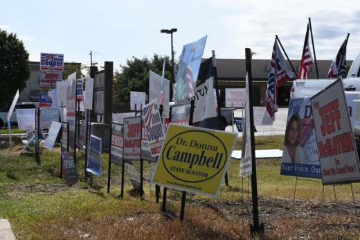 Candidate signs for a variety of races were on display outside a Cibolo polling location. (Jarrett Whitener/Community Impact)