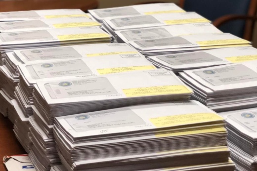 A stack of tax bills are shown.