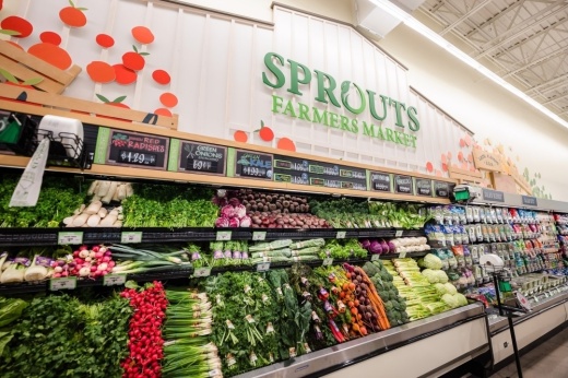 The produce section is shown inside a store.