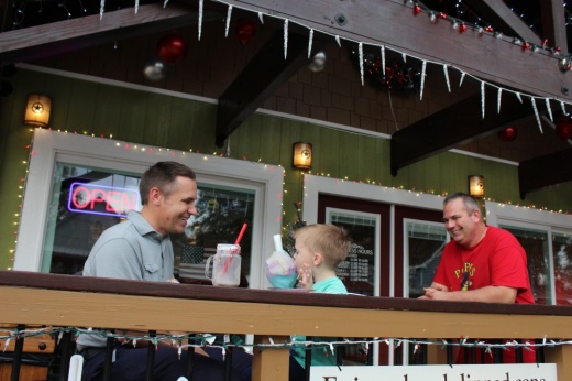 Father and son eating ice cream at Pop's in Old Town Spring