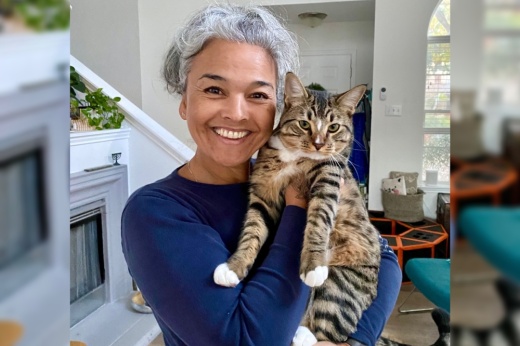 A woman holding a cat