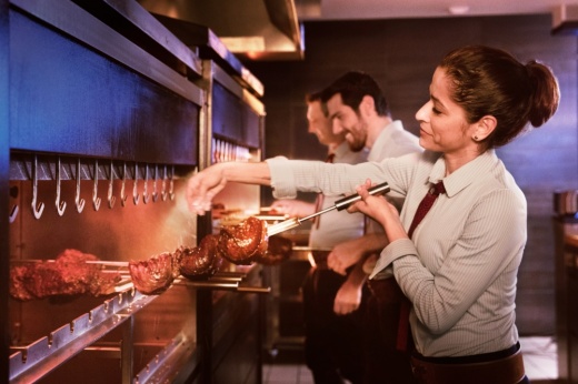 Fogo de Chão offers various seafood and meats grilled in Southern Brazil’s traditional churrasco style, which involves cooking skewered meat over an open flame. (Courtesy Fogo de Chão)
