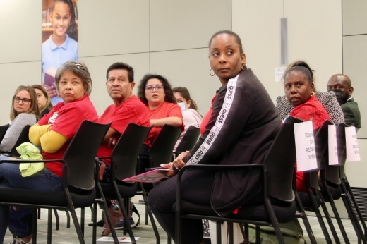 Shot of visitors at a Houston ISD board meeting