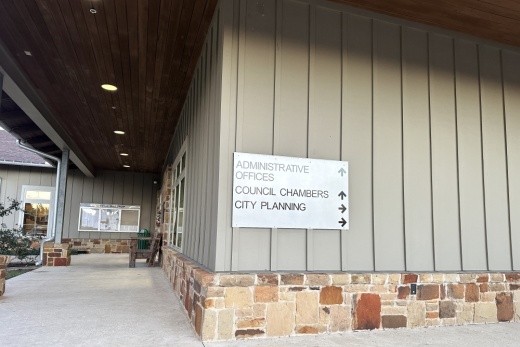 The city hall chambers exterior is shown.