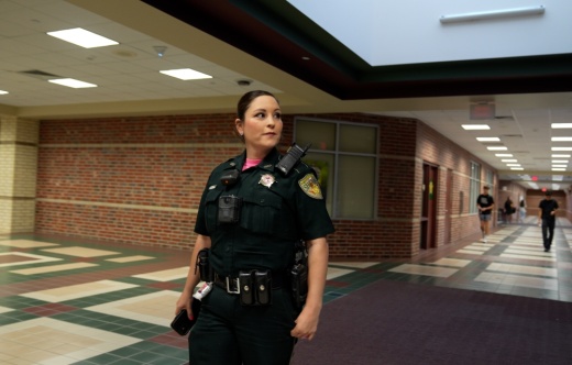 Sheriff liaison officer Megan Dolato patrols the halls of a school in Clear Creek ISD. (Courtesy Clear Creek ISD)