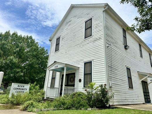 The white, wooden exterior is shown.