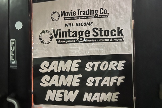 A poster announcing a name change on Vintage Stock's door