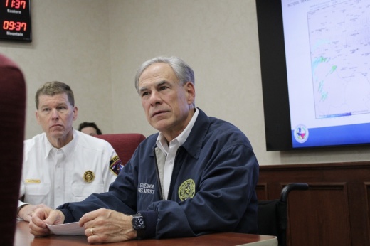 Gov. Greg Abbott receives a briefing from emergency management officials Jan. 8 in Austin.