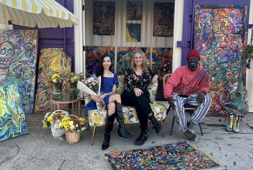 people gather at an open-air market