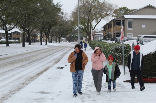 People walking along Bay Area Boulevard in Webster
